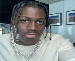 He is popular among fans due to his unique hairstyle and his catchy music.